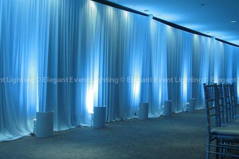 We adorned the walls with gorgeous, white floor-to-ceiling draping.  Therese  Jeff chose a crisp, blue uplighting color which accented the elegant pleated design and enhanced the winter theme of their wedding. Blue Uplighting Wedding, Blue Uplighting, Wall Draping, Morton Arboretum Wedding, Ceiling Drapery, Uplighting Wedding, Draping Wedding, Blue Drapes, Ceiling Draping