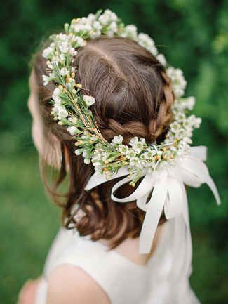 Crowned with green and white buds plus a silk bow will have your flower girl feeling like the belle of the ball. A simple braided halo lends a romantic vibe to her hairstyle. Flower Girl Hair Wreath, Girls Crown, Hair Wreaths, Hair Wreath, Flower Girl Hairstyles, Martha Stewart Weddings, Wedding Hairstyles Updo, Wedding Flower Girl, Girl Short Hair