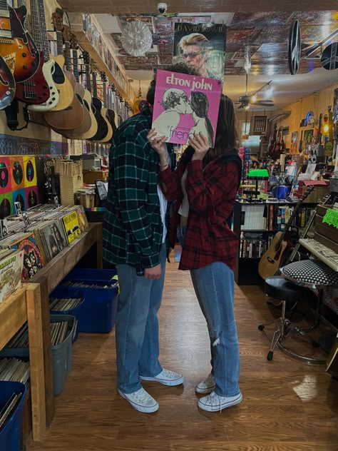 Double Fantasy Album Cover, Record Store Couple Aesthetic, Guitar Bf And Gf, Cute Date Pics Aesthetic, Nerd And Popular Couple Aesthetic, Musician Love Couple Aesthetic, Electric Guitar Couple Aesthetic, Bookstore Aesthetic Couple, Bf And Gf Matching Outfits Aesthetic