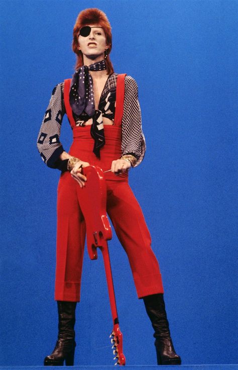 David Bowie's iconic style Glam Rock Fashion, David Bowie Costume, Bowie Fashion, Angela Bowie, David Bowie Fashion, Bowie Ziggy Stardust, David Bowie Ziggy Stardust, David Bowie Ziggy, Evolution Of Fashion