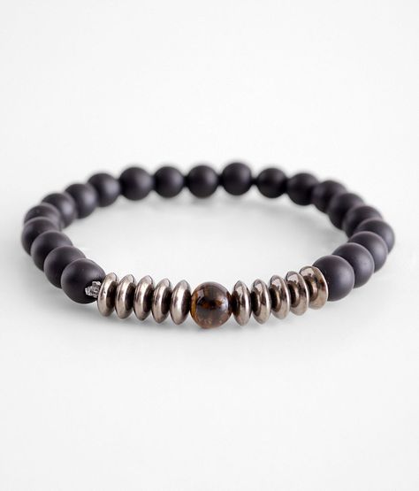 A stylish and versatile bracelet made with a variety of beads in different colors and shapes. Perfect for any man looking for a unique and eye-catching accessory.

#mensjewelry #mensaccessories #bracelet #beadedbracelet #fashion https://whispers-in-the-wind.com/discover-the-latest-mens-accessory-trends-for-2024/?knot-bead-bracelet-for-men Mens Hematite Bracelet, Men Bead Bracelet Ideas, Men Beaded Bracelet Ideas, Gratitude Ideas, Mens Stretch Bracelets, Bead Bracelet For Men, Mens Bracelet Designs, Mens Aesthetic, Trendy Mens Haircuts