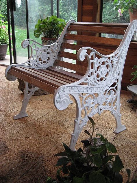 Old rusty bench pieces were given some TLC and paint. Old wood flooring was added for slats - now I have a sweet chair for my sunroom!   For… Park Bench Redo, Park Bench Ideas, Metal Outdoor Bench, Cast Iron Garden Bench, Wrought Iron Bench, Cast Iron Bench, Painted Benches, Old Benches, Patio Benches