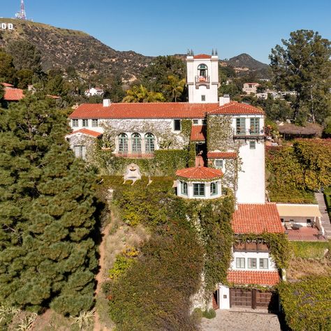 Madonna’s Former 1920s Spanish-Style Estate Is Listed for $21 Million | Architectural Digest Painted Beams, Pool Guest House, Hollywood Hills Homes, Spanish Villa, Hollywood Homes, Wood Beam Ceiling, Specimen Trees, Hollywood Hills, Historic Preservation