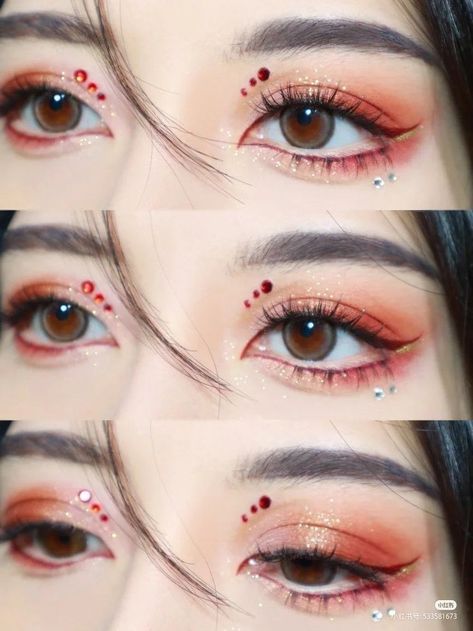 Red Asian Eye Makeup, Red Eyeshadow Rhinestones, Jewel Eye Makeup Rhinestones, Red Eyeshadow Makeup Looks, Red And Gold Makeup Looks, Simple Red Makeup, Simple Red Makeup Looks, Red Douyin Makeup, Christmas Makeup Looks Simple