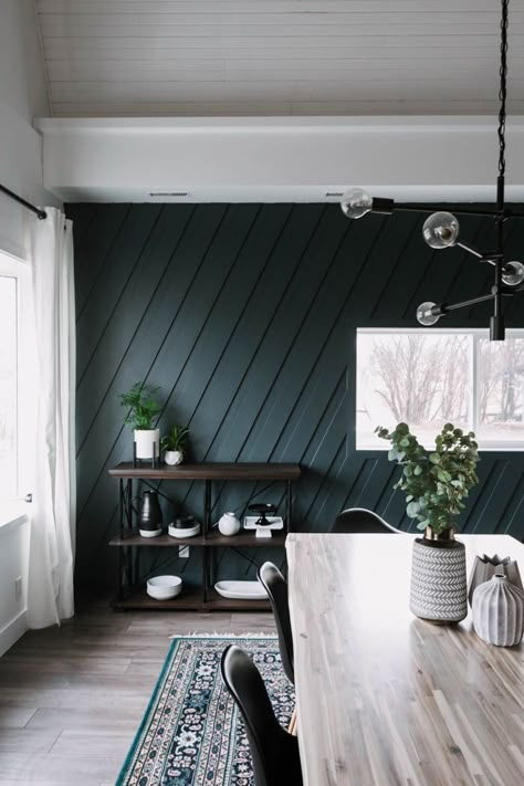 Beautiful modern dining room! Love the contemporary design in this quick renovation! As part of a weekend renovation, they painted a dark wall, added a moulding feature wall, and built a modern light wood table. The results are stunning! The dark wall colour called Midnight in NY is stunning against the light table and beautiful lighting. Can't wait to see what else gets added to this space! #minimalist #nordic #accentwall #featurewall #MDF #moulding #diningroom #darkwalls Feature Wall Living Room, Accent Wall Designs, Accent Walls In Living Room, Green Walls, Dark Wall, Dark Walls, Decor Minimalist, Modern Dining Room, New Wall