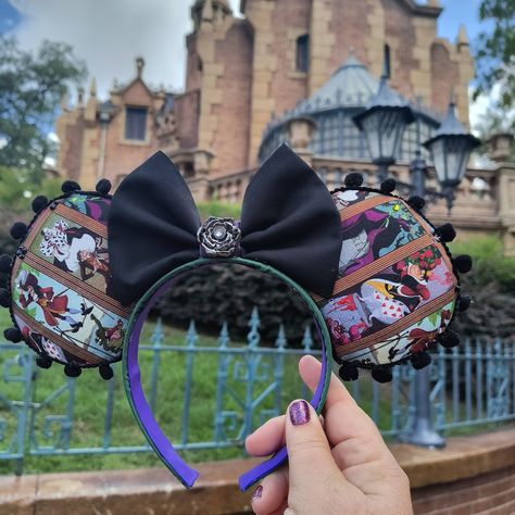 The Disney Villains in the Haunted Mansion Stretching Portraits Handmade Mickey Ears. These SUPER cute Ears sell for $25 plus shipping. Fast shipping 1 to 3 days. Check out my other Ears at https://onevillianboutique.etsy.com #disneyvillains #peterpan #cruella #sleepingbeauty #maleficent #queenofhearts #aliceinwonderland #hauntedmansion #magickingdom #disney #disneyland #disneylandparis #disneylove #disneylifestyle #disneylife #disneycrafts #diy #etsyshop #etsyseller Goth Disney Ears, Mickey Ears Villain, Haunted Mansion Mickey Ears, Goth Mickey Ears, Maleficent Mickey Ears, Disney Lifestyle, Diy Disney Ears, Disney Bound Outfits, Disney Life