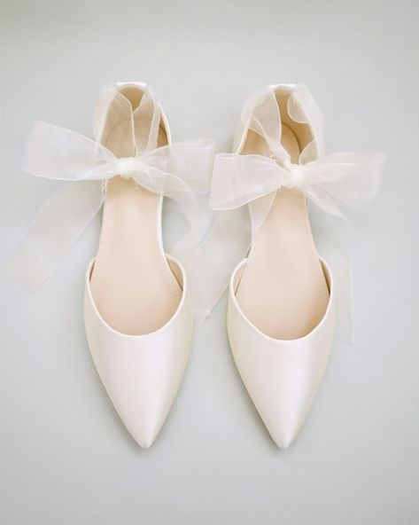 Satin pointy toe flats with satin ankle tie or ballerina lace up. Comfortable wedding shoes throughout ceremony and reception to dance the night away. *** YOU CAN ALSO CHOOSE STYLE OF ANKLE STRAP AT CHECKOUT*** DETAILS: UPPER: Synthetic upper and lining MATERIALS: Manmade outsole HEEL HEIGHT: 0.3" ORIGIN: Imported Wedding Flats With Bow, Wedding Ballerina Flats, Wedding Reception Shoes Dancing, Bride Flat Shoes, Bridal Flats Shoes, White Flats Wedding, Ballerina Wedding Shoes, Flat Wedding Shoes For Bride, Flat Shoes Wedding