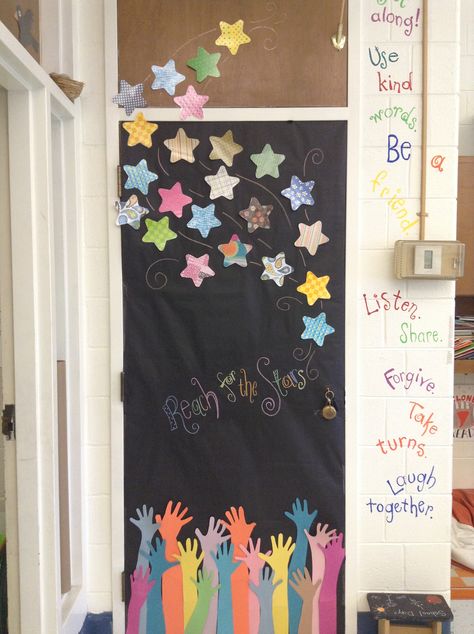 Reach for the stars door. Trace and use students hand for the bottom. Love this!! Stars Door Decorations Classroom, Star Classroom Decorations, Reach For The Stars Door Decoration, Star Classroom Door Ideas, Classroom Star Theme, Star Classroom Decor, Stars Classroom Door, Star Bulletin Board Ideas, Star Of The Month Board Ideas