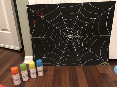 Black poster board and white out pen to make web with spider man stickers for a spray target. Silly string with spider spray printed paper taped on. Spiderman Birthday Party Decorations, Marvel Birthday Party, Superhero Theme Party, Spiderman Birthday Party, Batman Party, Spiderman Party, Mens Birthday Party, Diy For Men, Friends Party