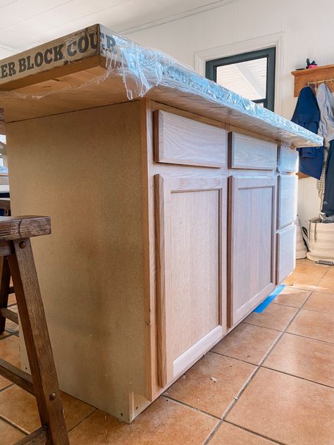 How to install a kitchen island on a tiled floor - Shoe Makes New How To Make Kitchen Island, Kitchen Island From Stock Cabinets, Turning Base Cabinets Into An Island, Diy Kitchen Island End Panels, Building A Kitchen Island From Stock Cabinets, How To Secure Kitchen Island To Floor, Cement Kitchen Floor, How To Install Kitchen Island, Moveable Kitchen Island