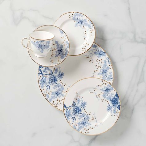 Inspired by toile artistry, the Lenox Garden Grove dinnerware collection features a monochromatic floral motif in rich shades of blue. Sparkling gold leaves and gold-accented rims are the perfect finishing touches to this delicate pattern. Garden Grove infuses traditional style and texture to create a memorable table. This collection is dishwasher safe, making it perfect for all occasions. White Dinnerware Set, Modern Floral Design, Toile Pattern, White Dining Room, Garden Grove, White Dinnerware, Blue Floral Pattern, Blue And White China, China Patterns