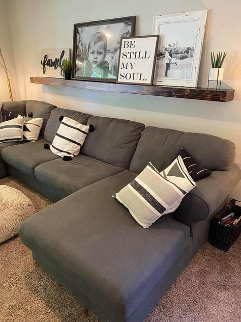 Living Room Decor Shelves Over Couch, Above The Couch Picture Ideas, Over The Couch Shelves, Long Shelves Over Couch, Farmhouse Living Room Behind Couch, Decor Above Large Couch, Decorating Above Sectional Couch, Living Room Wall Shelf Above Couch, Couch With Shelf Above