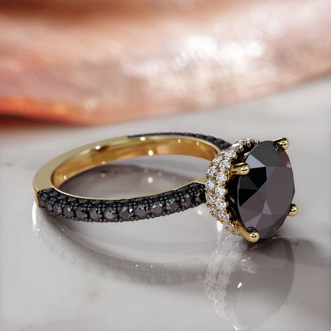 The Magia Negra Black Diamond Pavé Double Hidden Halo Set of Wedding Band and Engagement Ring, crafted in radiant 14K yellow gold, is a treasure of celestial mystique with a total carat weight of 4. At its core is a round black diamond, its deep hue intensified to capture the enigmatic essence of the night sky. Surrounding this central gem, a double halo of round black diamonds, weighing 1.3 carats, weaves a captivating spell of sophistication and secret allure. This ring is not just a piece of Antique Black Diamond Engagement Ring, Unique Black Diamond Engagement Ring, Wedding Band And Engagement Ring, Gold Black Diamond Ring, Black Diamond Earrings Studs, Black Diamond Necklace, Black Diamond Studs, Black Diamond Jewelry, White Diamond Earrings