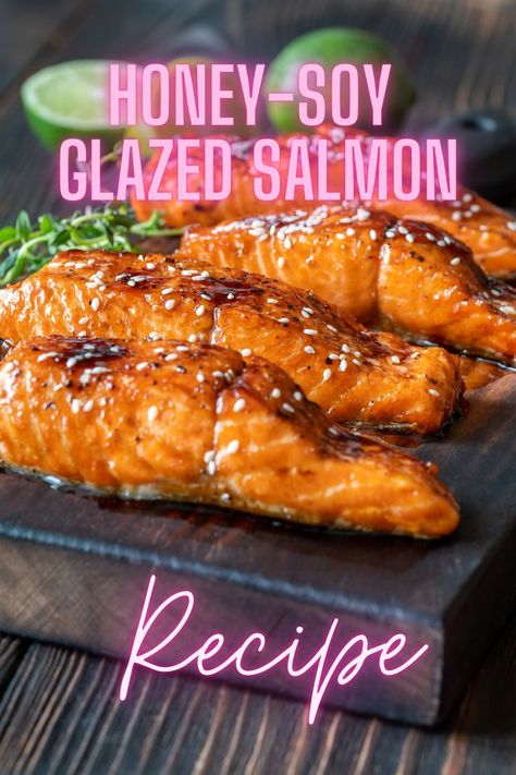 Indulge in the deliciousness of Honey-Soy Glazed Salmon! This recipe features tender salmon fillets coated in a mouthwatering glaze made with honey, soy sauce, lemon juice, garlic, ginger, and more. Simply bake until perfectly cooked and garnish with sesame seeds and green onions. Serve it hot with your favorite sides for a satisfying meal. Easy to make and bursting with flavor! #salmonrecipe #honeysoyglaze #easydinnerideas Sesame Soy Salmon, Soy Salmon, Salmon Glaze Recipes, Honey Sesame, Honey Soy, Glazed Salmon, The Hive, Salmon Recipe, Salmon Fillets