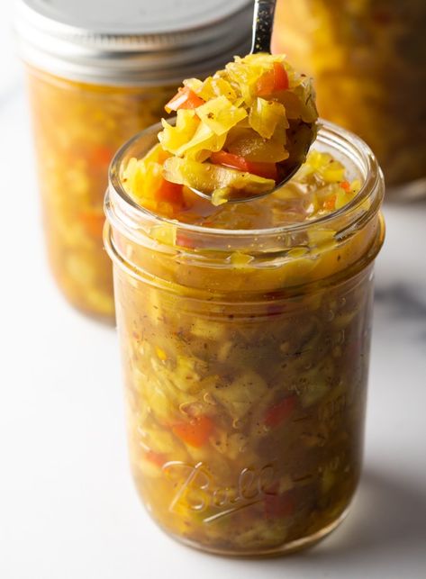 Glass jar of southern chow chow recipe. The lid is off and to the right side, a metal spoon is in the jar showing a scoop to camera. Southern Chow Chow Recipe, Southern Chow Chow, Pioneer Kitchen, Chow Chow Relish, Chow Chow Recipe, Chow Recipe, Relish Recipe, Gourmet Grilling, A Spicy Perspective