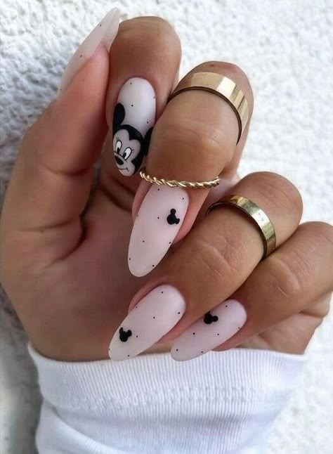 Matte finish white polish with black Mickey mouse nail art on medium round nails Subtle Disney Nails, Classy Disney Nails, Mouse Nail Art, Disneyland Nails, Disney Nail Designs, Mickey Mouse Nails, Disney Inspired Nails, Disney Acrylic Nails, Minnie Mouse Nails