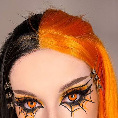 Leah Sapp on Instagram: "Some pics of the spider web look I posted a tutorial on the other day! I always say I wish my real eye color was red but now orange might be a close second fave 😫 . Makeup details- Eyes: @aboutfacebeauty matte fluid eye paints in spectre and art of darkness, liner in into the void @bellabeautebar best mattes palette @kaima_cosmetics loose pigment in buttercup @nyxcosmetics epic ink liner and glitter glue @glisten_cosmetics wet liner in carrot cake @benefitcosmetics gim Spider Liner Makeup, Spider Man Makeup Women Eye, Halloween Inspired Eye Makeup, Halloween Inspired Eyeshadow, Orange Halloween Makeup Looks, Red Liner Makeup Looks, Spider Web Liner, Spiderweb Makeup Eye, Cobweb Makeup