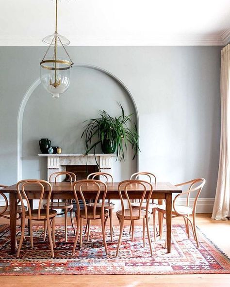 Sunlit spaces in this stunning dining room via @insideoutmag 📷 #annabellehickson | #dining #spaces #living Red Rug Dining Room Ideas, Clad Home, Gray Walls, Wood Chairs, Edwardian House, Rooms Ideas, Bentwood Chairs, Elegant Dining Room, Deco Boheme