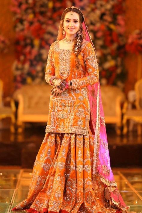 Looking for more such Sharara suits ? Head to out blog, Click on the link attached below for more such wedding fashion inspiration, ideas and trends.  #indianweddings #shaadisaga #intimateweddings #bridalfashion #sharara #shararasuit #pakistanisuit #pakistaniwear #trendyshararasuit Pakistani Mehndi Dress, Mayon Dresses, Mehndi Bride, Weddings Dress, Pakistani Mehndi, Bridal Mehndi Dresses, Sharara Designs, Mehndi Dresses, Mehndi Dress