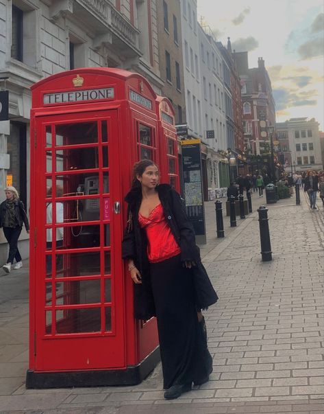 red and black outfit red silk top black long skirt london phone cabin Red And Black Outfit, Red Silk Top, Black Long Skirt, Red Corset Top, Red And Black Outfits, Long Black Skirt, London Aesthetic, Red Corset, Outfit Red