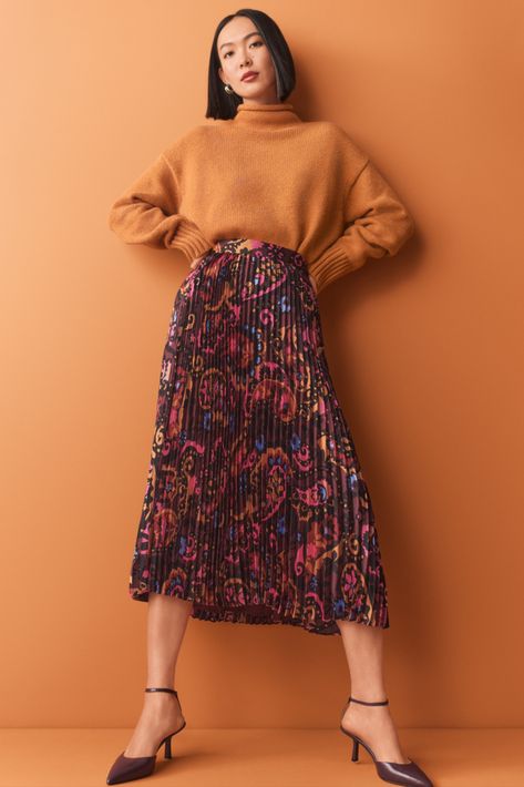 In rich autumnal hues, our pleated midi skirt puts a modern spin on a classic paisley print. Hidden side zipper with hook-and-eye closure. Pleated Midi Skirt Outfit, Midi Skirts Style, Midi Skirt Outfit, Knitted Suit, Skirt Outfit, Pleated Midi Skirt, Work Outfits, Skirt Outfits, Paisley Print