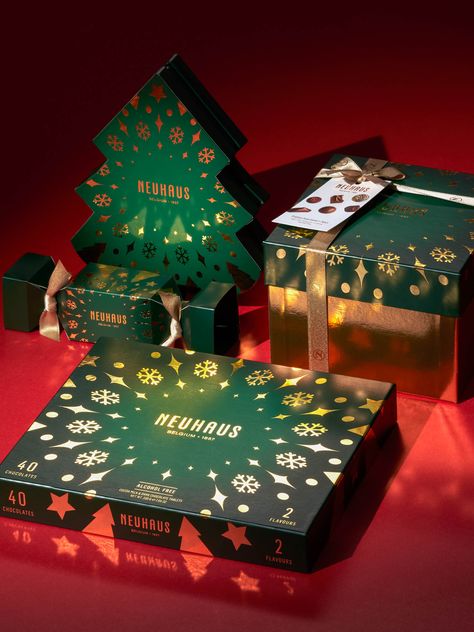 WeWantMore - Neuhaus Holidays 2019 - World Brand Design Society  /  The holidays are literally the darkest time of the year, outside at least. Inside people decorate their trees with Christmas lights, sit around the fireplace and use candles to light up their homes and hearts. Christmas Candle Packaging Design, Xmas Packaging Design, Holiday Package Design, Christmas Box Design Packaging, Christmas Packaging Design Inspiration, Christmas Package Design, Christmas Box Packaging, Christmas Box Design, Packaging Design Christmas