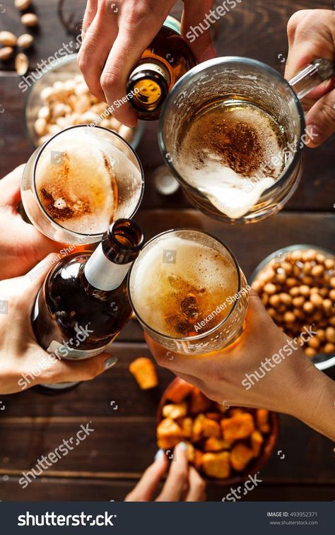 Clinking glasses with beer over wooden table, close up on three beer glasses and two bottles royalty free images photo Most Popular Alcoholic Drinks, Popular Alcoholic Drinks, Beer Photography, Beer Photos, Pizza And Beer, Beer Shop, Beer Pub, Pub Food, Burger Bar