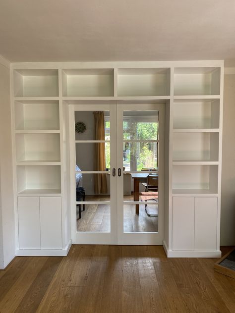 Built In Storage Around Doorway, Built In Shelving Around Doorway, Built Ins Around Sliding Glass Door, Bookshelf Wall With Door, Shelving Around Doorway, Built In Around Door, Office With High Ceilings, Built Ins Around Door, Bookshelves Around Doorway