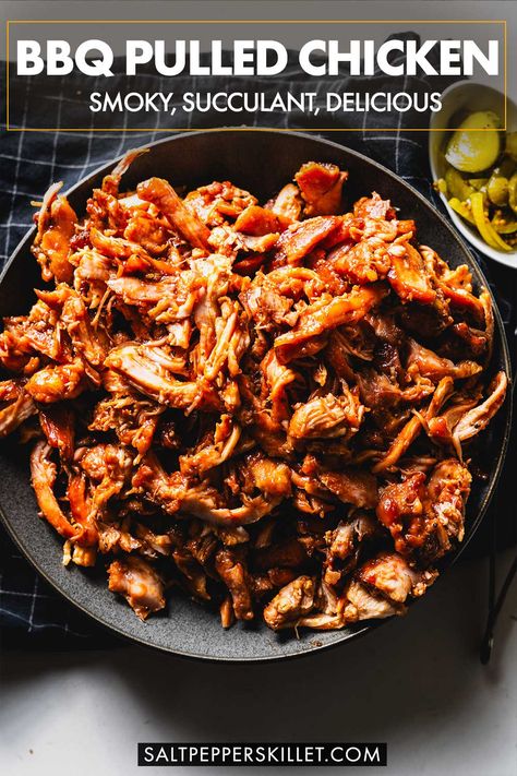 Smoky, succulent, and crave-worthy. This wood-smoked pulled chicken so tender and saucy, you'll want to pile it high on everything from buns to nachos to salads. 4 ingredients and a 1 hour cook time in the smoker. Bbq Smoker Recipes Chicken, Healthy Smoker Recipes, Smoked Pulled Chicken, Chicken With Bbq Sauce, Bbq Pulled Chicken Recipes, Gf Dinners, Pulled Pork Leftover Recipes, Smoked Chicken Recipes, Pulled Chicken Recipes