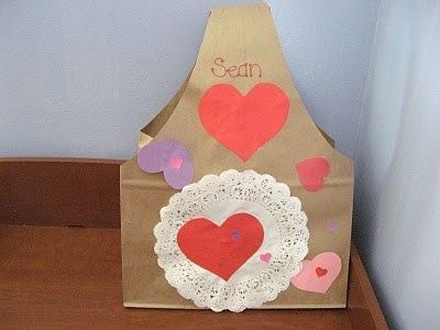 Valentine holder using paper sacks Valentines Card Holder, Kindergarten Valentines, Valentine Mailbox, February Crafts, Happy Hearts Day, Preschool Valentines, February Valentines, Valentine Activities, School Daze