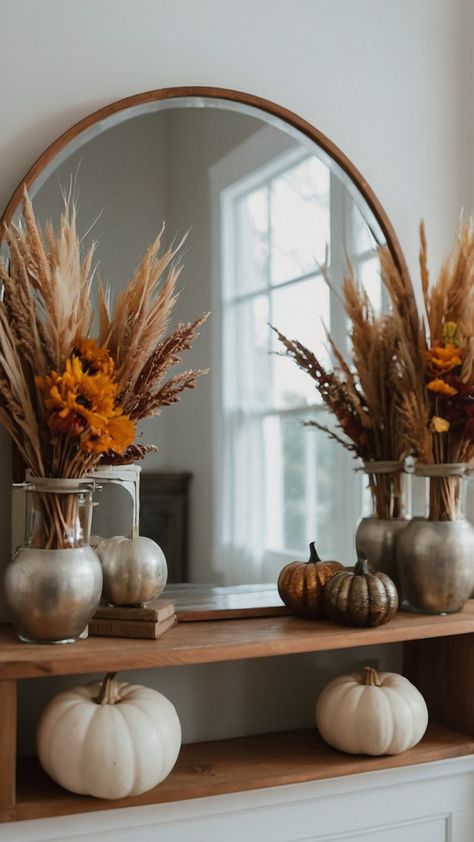 Create a cozy and inviting atmosphere in your home with beautiful neutral fall decor From the front porch to the living room DIY your way to a farmhouse-inspired space Get inspired for your bedroom mantle kitchen and fireplace with our tips for the home in 2022 2023 and beyond Fall Mirror, Fall Decor Round Mirror, Fall Amber Glass Decor, Fall Fireplace Mantel Decorating Ideas Wreaths & Garlands, Neutral Fall Decor Ideas, Fall Garland Mantle Lights.com, Fall Mantle, Neutral Tops, Neutral Fall Decor