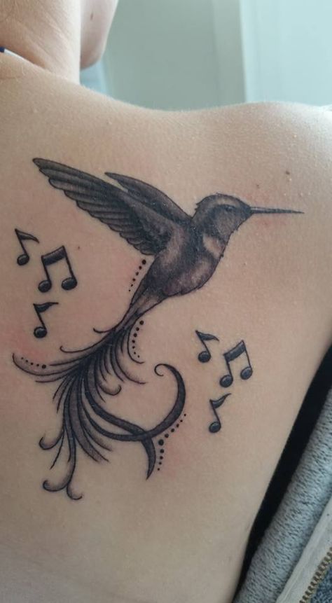 Humming bird tattoo with music notes on my shoulder blade. Hummingbird Music Notes Tattoo, Hummingbird Tattoo With Music Notes, Hummingbird Guitar Tattoo, Song Bird Tattoos For Women, Bird Music Tattoo, Tattoo Ideas Wrist, Songbird Tattoo, Bird Tattoo Ideas, Tat Inspiration