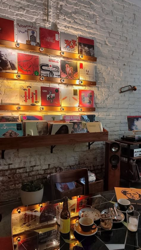 Uk Coffee Shop, Hip Coffee Shop, Modern Retro Restaurant, Vinyl Cafe Aesthetic, 70s Cafe Aesthetic, Record Store Coffee Shop, Vintage Coffee Shop Decor, Indie Coffee Shop Aesthetic, 2000s Coffee Shop Aesthetic