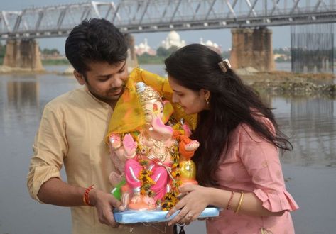 A married couple carries Lord Ganesh idol during Ganpati Visarjan in river Yamuna, in Agra Image Credit: ANI Ganesh Chaturthi Visarjan, Ganesh Ji Visarjan, Ganesh And Kartikeya, Man Manifestation, Ved Vyas And Ganesh, Ganesh Sthapna Wedding, Ganesh Visarjan, Ganesh Utsav, Ganesh Idol