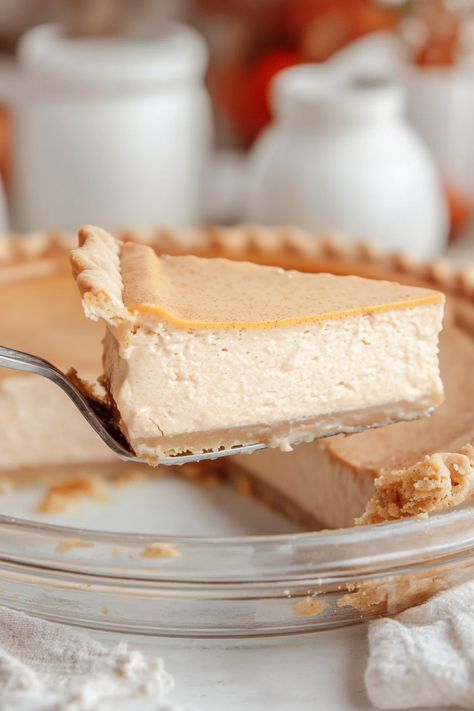 Indulge in the perfect fall dessert with this heavenly White Pumpkin Pie recipe! Creamy, flavorful, and aromatic, this pie is a delightful twist on the classic pumpkin pie. The combination of sweet white chocolate and cozy pumpkin spice creates a mouthwatering experience that is sure to impress your family and friends. Easy to make and perfect for Thanksgiving or any autumn gathering. Elevate your dessert game with this delicious white pumpkin pie that will have everyone asking for seconds! Spiced Pumpkin Pie, White Pumpkin Pie Recipe, White Pumpkin Pie From Scratch, Honey Pumpkin Pie, White Pumpkin Cheesecake, Original Pumpkin Pie, White Potato Pie, Pumpkin Pie White Russian, Fireball Pumpkin Pie Recipe