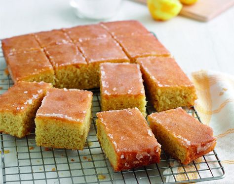 Lemon drizzle cake is a classic and this version from the Queen of baking is so easy to make and can happily serve a large group so it’s perfect if you’re expecting friends round for tea. #maryberry #maryberrycakerecipes #lemoncakerecipe Lemon Drizzle Traybake, Mary Berry Recipe, Tray Bake Recipes, Lemon Drizzle Cake, Tray Bake, Drizzle Cake, Bake Cake, Lemon Drizzle, Cake Baking Recipes