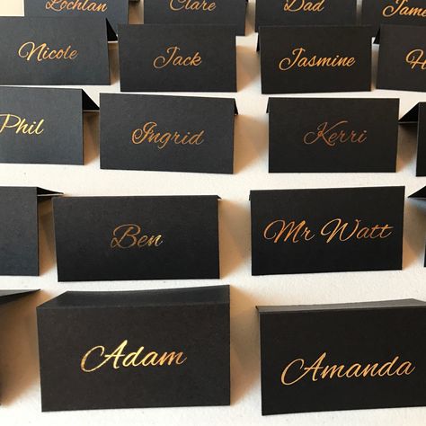 Black and gold foil tent place cards Black And Gold Place Cards, Black And Gold Name Cards, Men Black And Gold Party Ideas, Black And Gold Place Setting, Table Setting Name Cards, Black And Gold Party Decorations Table, Gold Prom Decorations, Black And Gold Birthday Dinner, Birthday Decorations Black And Gold