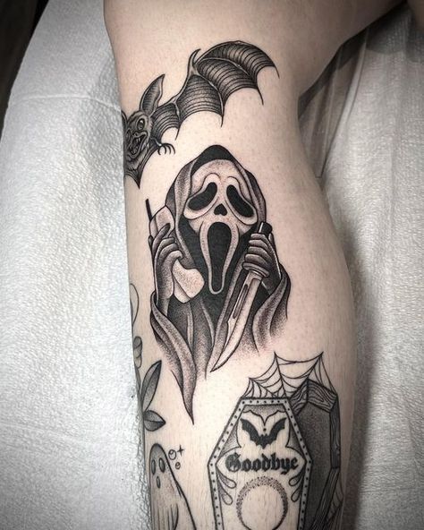 Horror Patchwork Tattoo Sleeve, Cool Spooky Tattoos, Horror Movies Tattoos Ideas, Goth Inspired Tattoo, Halloween Patch Work Tattoo, Dark Spooky Tattoos, Ghostface Thigh Tattoo, Ghost Arm Tattoo, Spooky Leg Tattoos