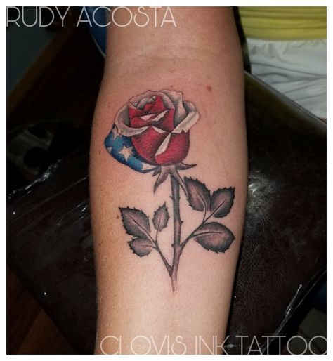 American flag rose tattoo  on arm. Flag rose tattoo. Artist and painter #rudy #rudyacosta from tattoo shop Clovis ink tattoo.   #flag #flagtattoo #america #americanflag #americanflagtattoo #redwhiteblue #military #militarytattoo military tattoo with usa flag. Follow rudyta2  Rudyta2 Rudyshow American Flag Female Tattoos, Red White And Blue Rose Tattoo, America Tattoos Women, American Flag Rose Tattoo, Patriotic Rose Tattoo, Military Tattoos Women, Flag Rose Tattoo, America Tattoo For Women, Flag Tattoo For Women