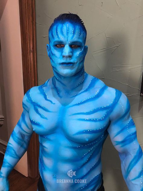 Man painted with blue body paint and blue zebra stripes like Avatar character. Blue Avatar Costume, Body Painting Men, Guy Face, Avatar Makeup, Avatar Halloween, Stilt Costume, Underwater Photoshoot, Blue Avatar, Halloween Ball