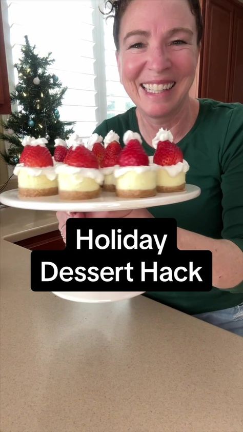 Best Christmas dessert hack for your next holiday party! Santa Hat Che... | christmas desserts | TikTok Dessert Cheese Ball Christmas, Santa Cheesecake Bites, Store Bought Dessert Hacks, Costco Cheesecake Hack, Store Bought Cheesecake Hacks, Costco Cheesecake, Santa Cheesecake Hats, Santa Hat Cheesecake Bites, Santa Cheesecake