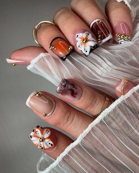 Fun fall mix and match press on nails set 🧡🦓 • • • • #nails #pressons #pressonnailbusiness #nailart #naildesign #nailartist #nailsnailsnails #businessowner #follow #like #fallnails #falldesignnails #autumn #autumnnails #designnails #nailtech #flowernails #frenchtipnails #cheetahprint #cheetahprintnails #zebraprint #zebraprintnails #auranails #brownnails #orangenails #whitenails Arizona Nail Designs, Bright Fall Nails, Fall Flower Nails, Western Fall Nails, Sims Challenge, Zebra Print Nails, Cheetah Print Nails, Set Nails, Sassy Nails