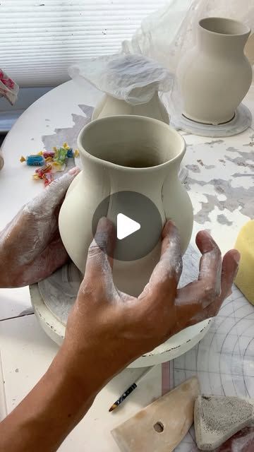 Queen Bee Pottery by Karrita on Instagram: "Using my fingers to curve and shape a wheel thrown ceramic vase form. Sharing some older videos this week while I get to glazing the new garden inspired collection. 
🌸
🌸
🌸
🌸
#modernmaker #ceramicsreels #ceramicsreel #ceramics #pottery #potteryreels #potteryvideo  #artistpotter #makersgonnamake #maker  #ceramicist"