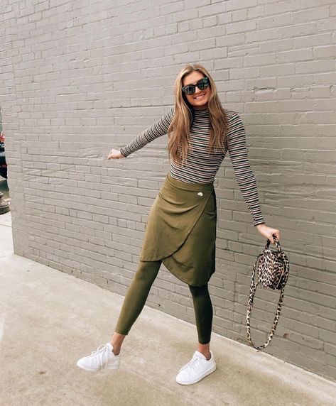 Snoga Athletics on Instagram: “@summerdawnsidlo NOT SURE WHAT WE LOVE MORE? “ANKLE FAUX WRAP IN DARK OLIVE” OR YOUR STRIPED SHIRT AND LEOPARD BAG?? HMMM... 15% Off Two…” Workout Skirts Outfit, Modest Activewear Outfits, Athletic Modest Outfits, Athletic Outfits Modest, Modest Athleisure Outfits, Snoga Athletic Skirt Outfit, Skirt Workout Outfit, Modest Fitness Outfits, Hiking Skirt Outfit