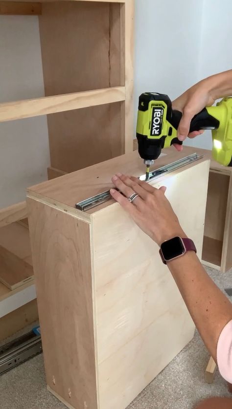 Melissa Tyler drilling the drawer slides on the back of drawers for her DIY custom closet. How To Add Drawers To A Closet, How To Build Drawers, How To Make A Drawer, Diy Closet Drawers, Diy Closets, Diy Pantry Shelves, Diy Walk In Closet, Diy Custom Closet, Entryway Laundry