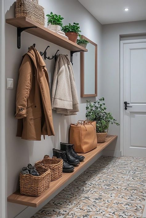 29 Tiny Apartment Entryway Ideas That Combine Function and Style 7 Open Shelving Entryway, Entrance Hall Ideas Shoes, Hallway Seating And Storage Ideas, Small Entryway Bench And Hooks, Small Entryway Ideas Raised Ranch, Small Coat Hook Area, Apartment Front Entrance Ideas, Different Entryway Ideas, Hallway Storage For Hats And Gloves