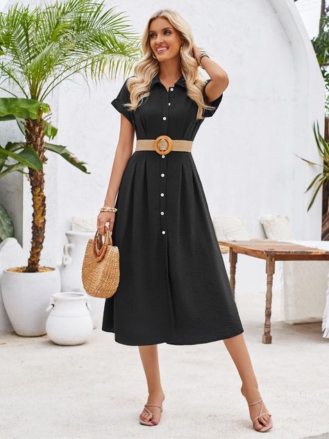 Turn heads in the playful Abigail Collared Midi Shirt Dress. This dress features a unique collared neckline and a flattering midi length, making it a versatile and stylish addition to your wardrobe. With its classic black color, you'll stand out in any crowd. Perfect for adding a touch of fun to any occasion. Size Guide: Model is 5’7” tall, and has a 33.6” bust, 24.1” waist, & 35.2” hips. She is wearing a S / US 4 / AU 8. This dress is true to size. Material: 100% Polyester. Feature: Collared. Short Sleeves. Midi length. Front button closures. Cut-Out Back. Not Lined. Care Instructions: Machine wash / Cold hand wash Black Shirt Dress Outfit Casual, Exotic Prom Dresses, Black Shirt Dress Outfit, Dress Outfit Casual, Chic Cocktail Dress, Shirt Dress Outfit, Style Capsule, Elegant Evening Gowns, Outfit Tips