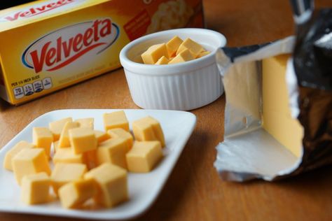 Melting Velveeta transforms it from a block of semi-soft cheese to a gooey topping or main dish component with a distinct American cheese flavor. It melts easily on the stovetop, in the microwave or in a slow cooker. Use it to make Velveeta cheese sauce, nachos or macaroni and cheese. Velveeta Cheese Dip, Velveeta Cheese Sauce, Melted Cheese Sauce, Easy Cheese Dip, Quick Mac And Cheese, How To Make Cheese Sauce, Stovetop Mac And Cheese, Easy Cheese Recipes, Broccoli Cheese Soup Recipes