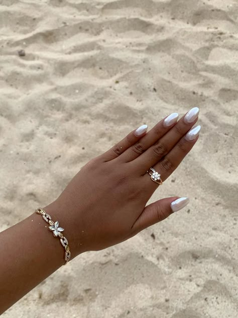 In love with my milky pearl chrome nails White Nail Designs With Pearls, White Milky Chrome Nails, Mini Pearls On Nails, White Pearly Acrylic Nails, Pearly White Chrome Nails, Beach Girl Aesthetic Nails, White Chrome Pedicure, Milk Chrome Nails, Birthday Nails December