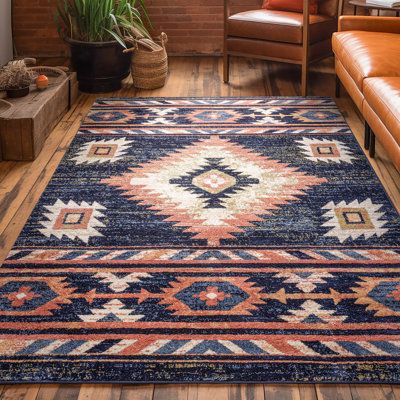 The collection draws upon a curated array of traditional Persian, southwestern, and Moroccan designs. A warm palette of red, blue, and green jewel tones is accented by neutral colors of ivory and beige for a rug that's easy to match with any decor. Union Rustic Rug Size: Rectangle 3'9" x 5'3" | Blue;white Rectangle 3'9" x 5'3" Area Rug - Union Rustic Lorelee Moroccan Southwestern Blue Beige Area Rug 45.0 x 0.4 in blackPolypropylene | Wayfair Western Bedroom, Floor Stain, Warm Palette, Southwestern Patterns, Southwestern Area Rugs, Blue Orange White, 6x9 Area Rugs, Well Woven, Western Homes